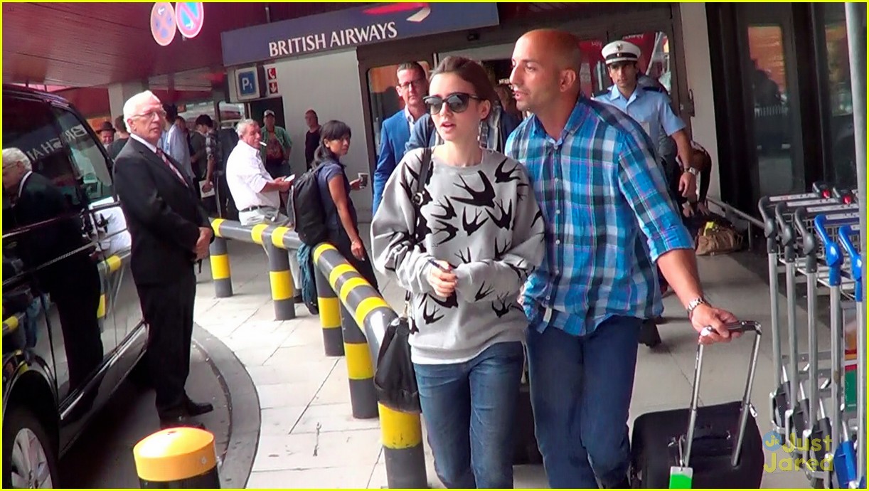 lily collins jamie campbell bower arrive in berlin 20