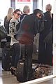 lily collins jamie campbell bower arrive in berlin 37