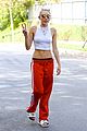 miley cyrus tongue out red pants 10