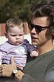 harry styles holds adorable baby fan in australia 12