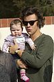 harry styles holds adorable baby fan in australia 13