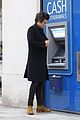 harry styles stops at the atm 02