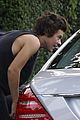 harry styles stops at the atm 03