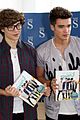 union j book signing liverpool manchester 18