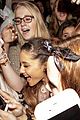 ariana grande amsterdam arrival with fans 01