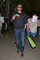 kellan lutz back in la after flying with miley cyrus 11