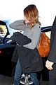 emma stone hits lax after golden globes 2014 15