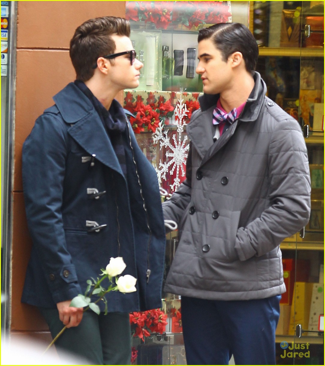 darren criss leans on chris colfer while filming glee 05