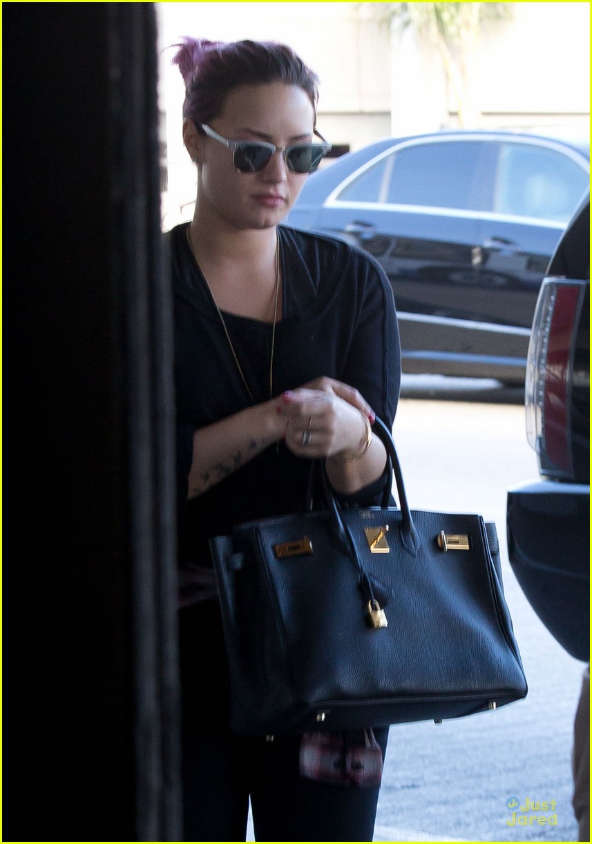 demi lovato jets out of lax before first neon lights tour stop 04