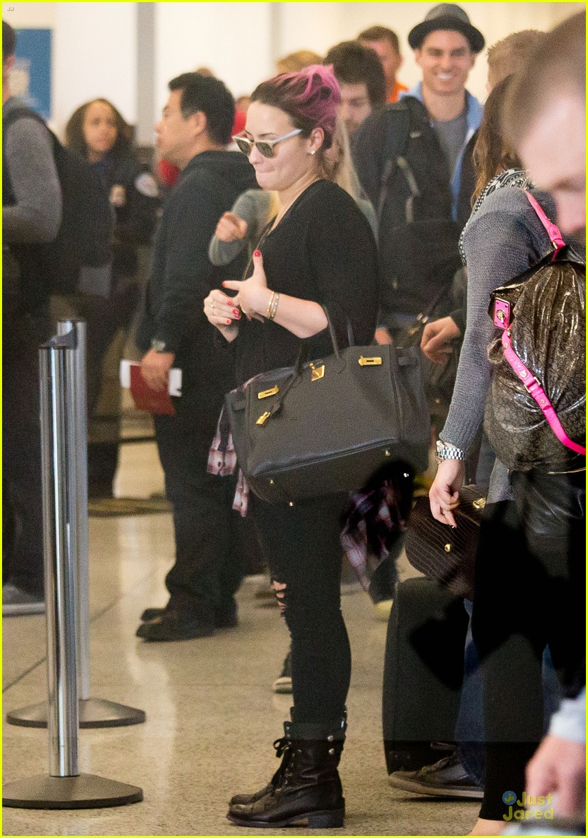 demi lovato jets out of lax before first neon lights tour stop 05
