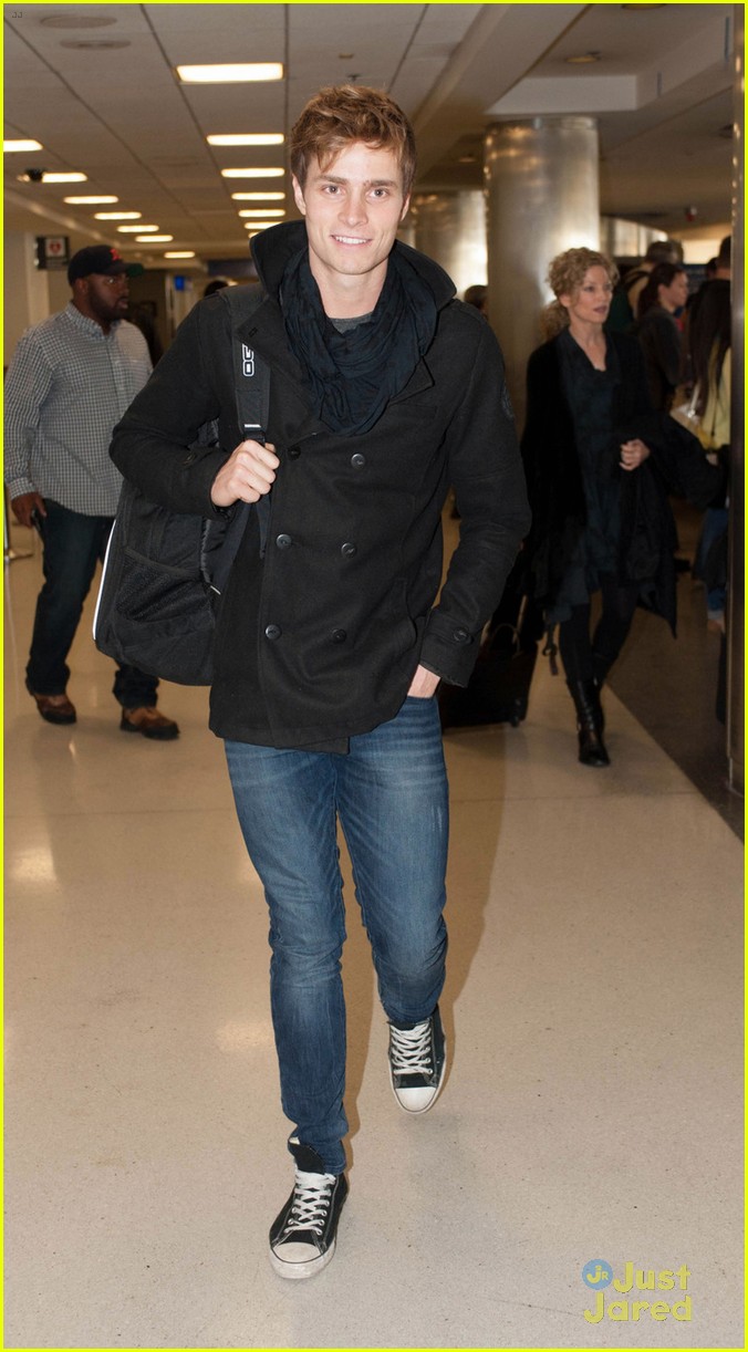 spencer sutherland hits lax airport after vampire academy premiere 01