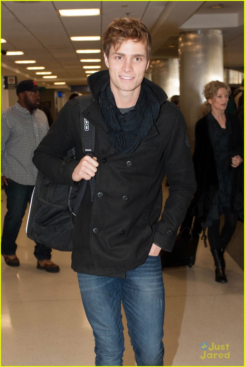 spencer sutherland hits lax airport after vampire academy premiere 02