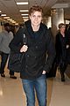 spencer sutherland hits lax airport after vampire academy premiere 02