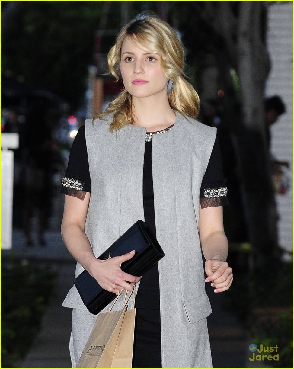 dianna agron signs glee sweater for charity 04