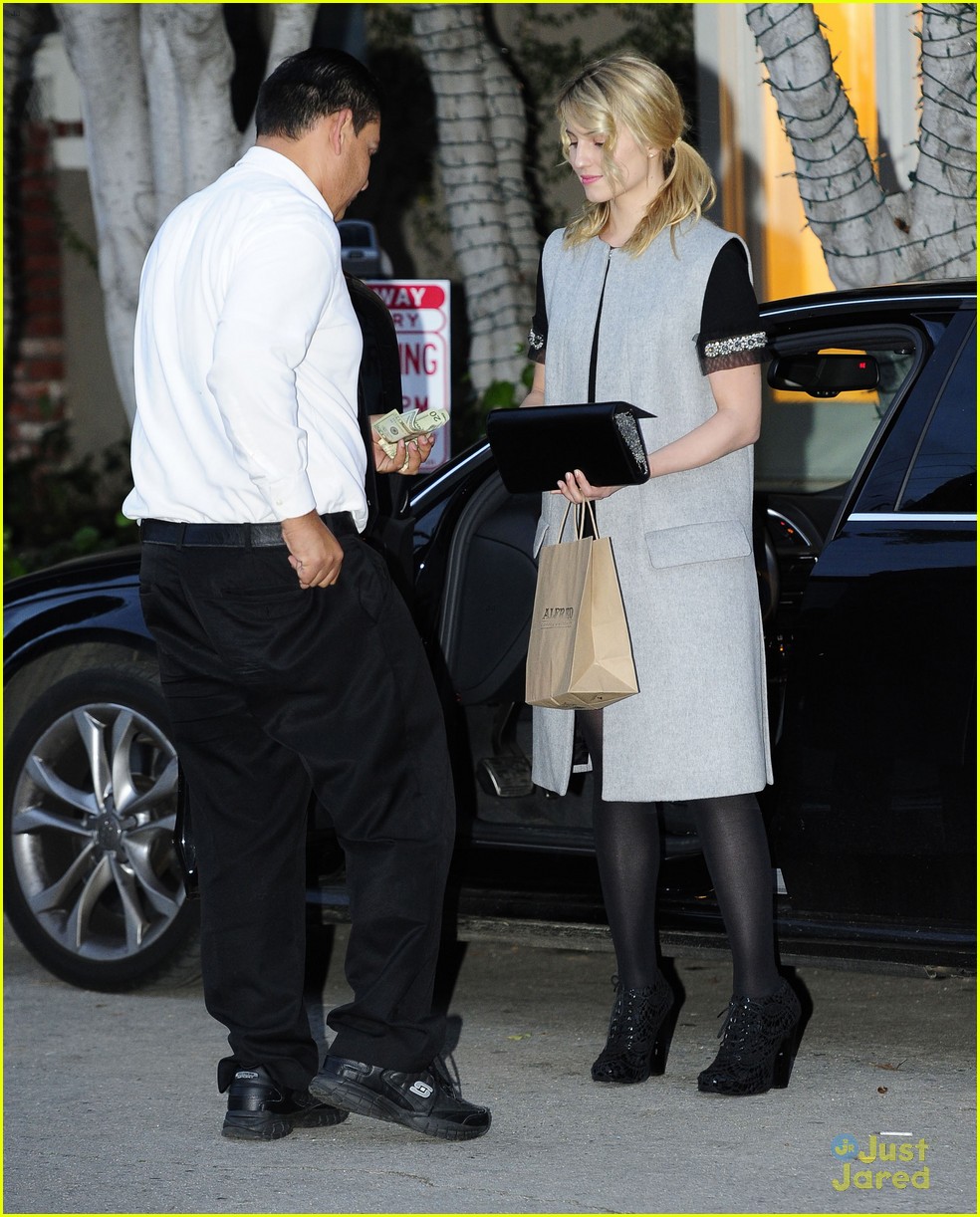 dianna agron signs glee sweater for charity 05