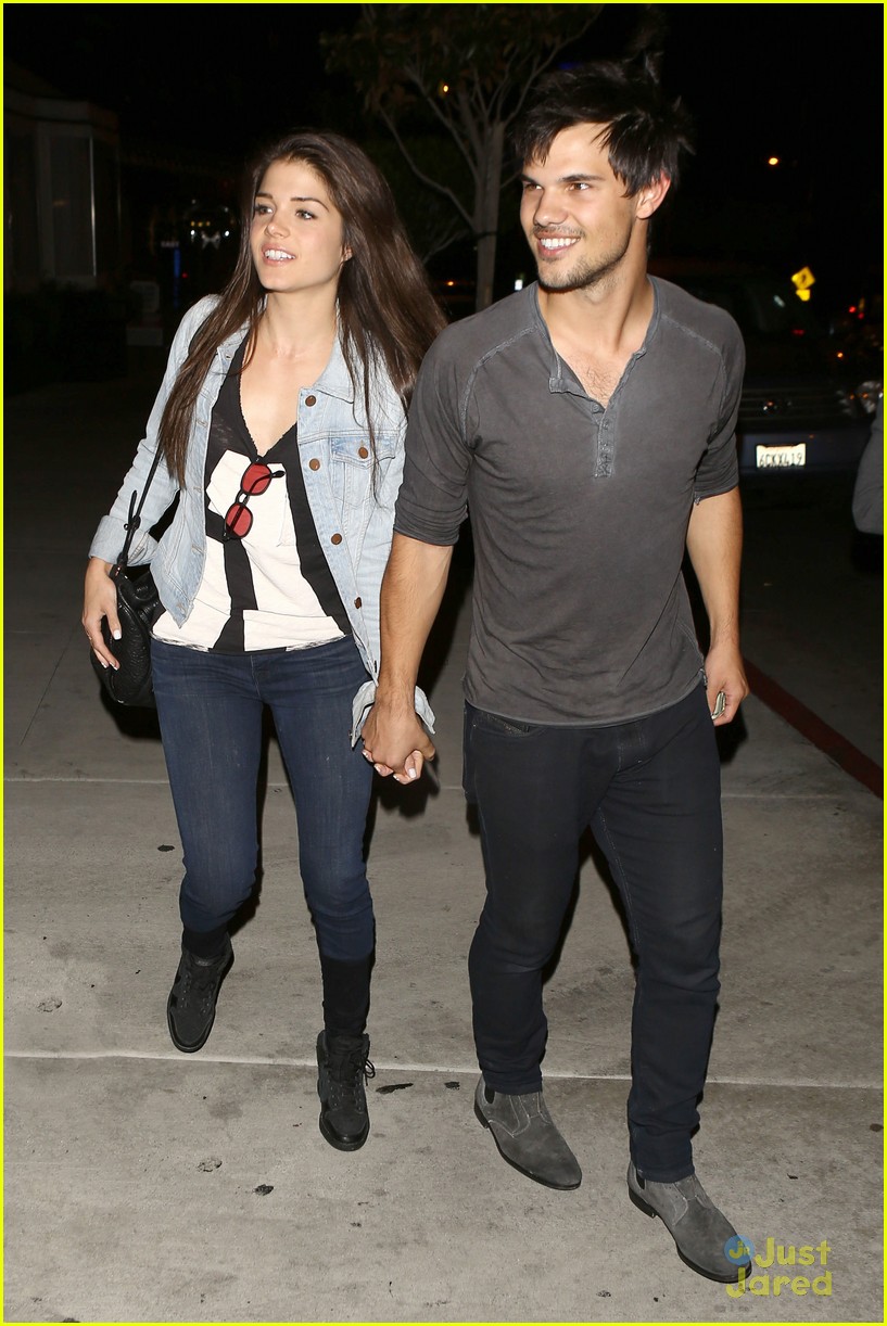 taylor lautner marie avgeropoulos hold hands 01