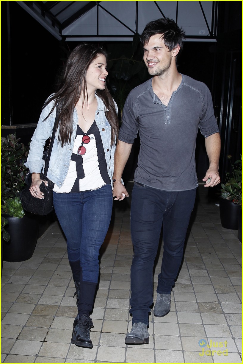 taylor lautner marie avgeropoulos hold hands 07