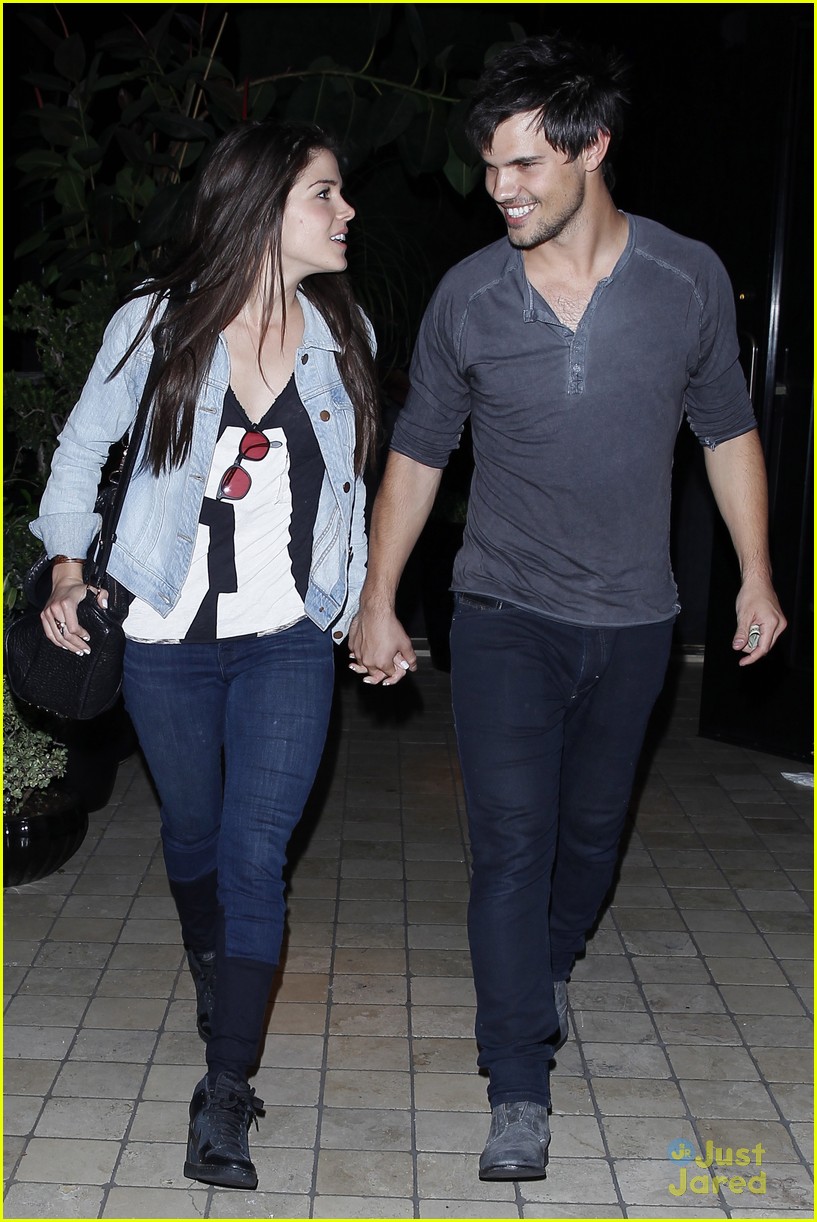 taylor lautner marie avgeropoulos hold hands 10