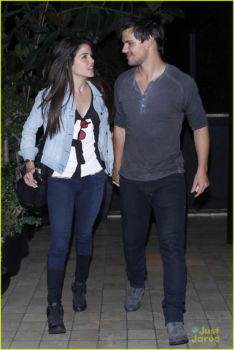 taylor lautner marie avgeropoulos hold hands 15