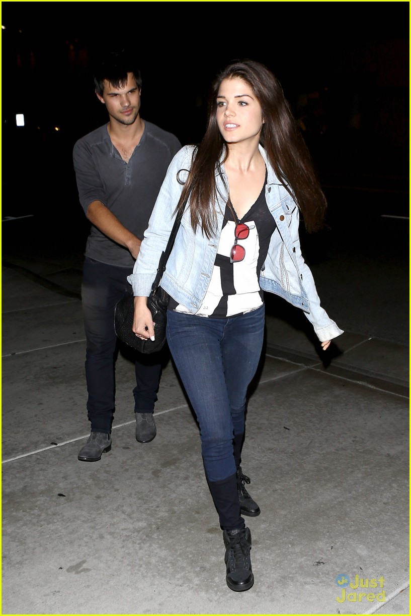 taylor lautner marie avgeropoulos hold hands 21