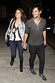 taylor lautner marie avgeropoulos hold hands 01