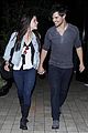 taylor lautner marie avgeropoulos hold hands 10