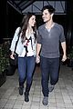 taylor lautner marie avgeropoulos hold hands 12