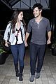 taylor lautner marie avgeropoulos hold hands 13