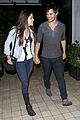 taylor lautner marie avgeropoulos hold hands 14