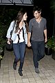 taylor lautner marie avgeropoulos hold hands 19