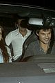 taylor lautner marie avgeropoulos hold hands 25