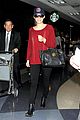 emmy rossum flashes a smile at lax airport 07