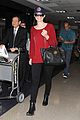 emmy rossum flashes a smile at lax airport 08