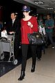 emmy rossum flashes a smile at lax airport 14