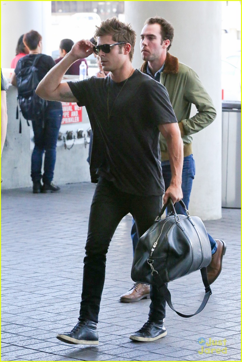 zac efron bed head hair arrival 05