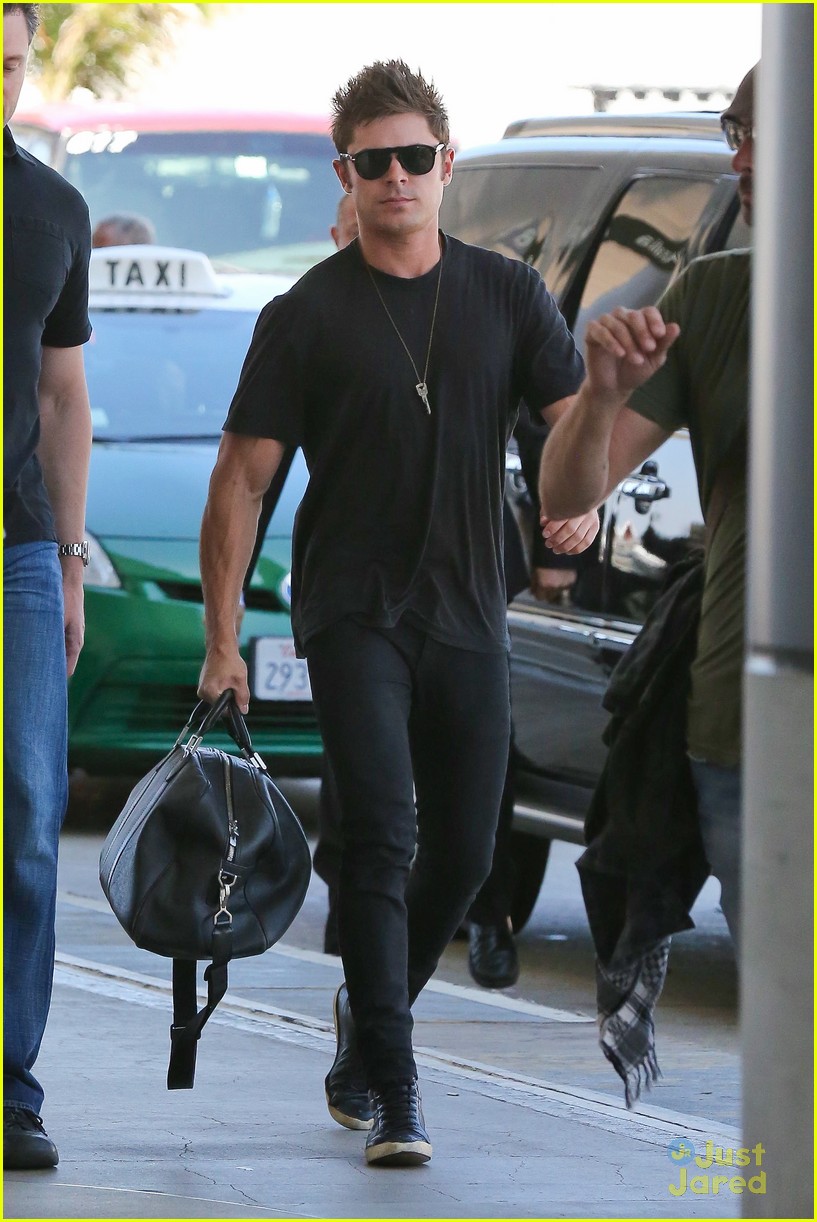 zac efron bed head hair arrival 06