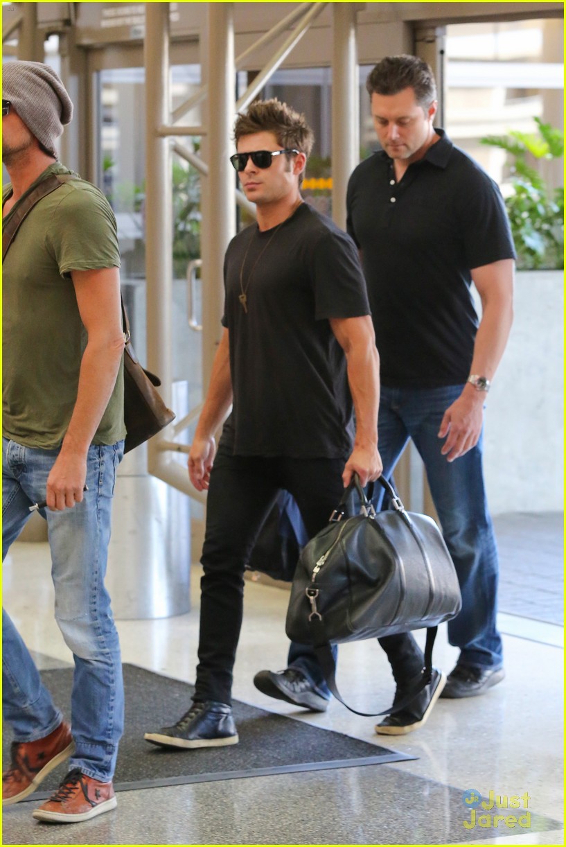 zac efron bed head hair arrival 08