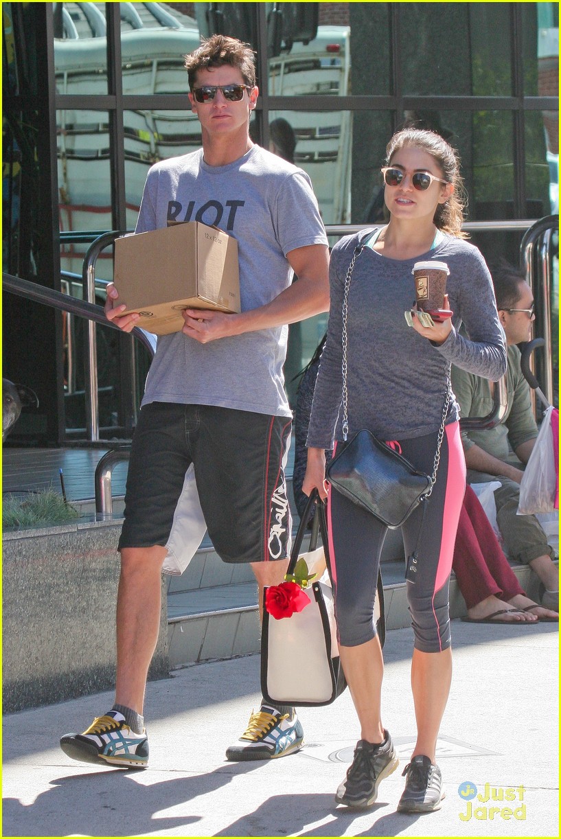 nikki reed links arms with a guy friend08