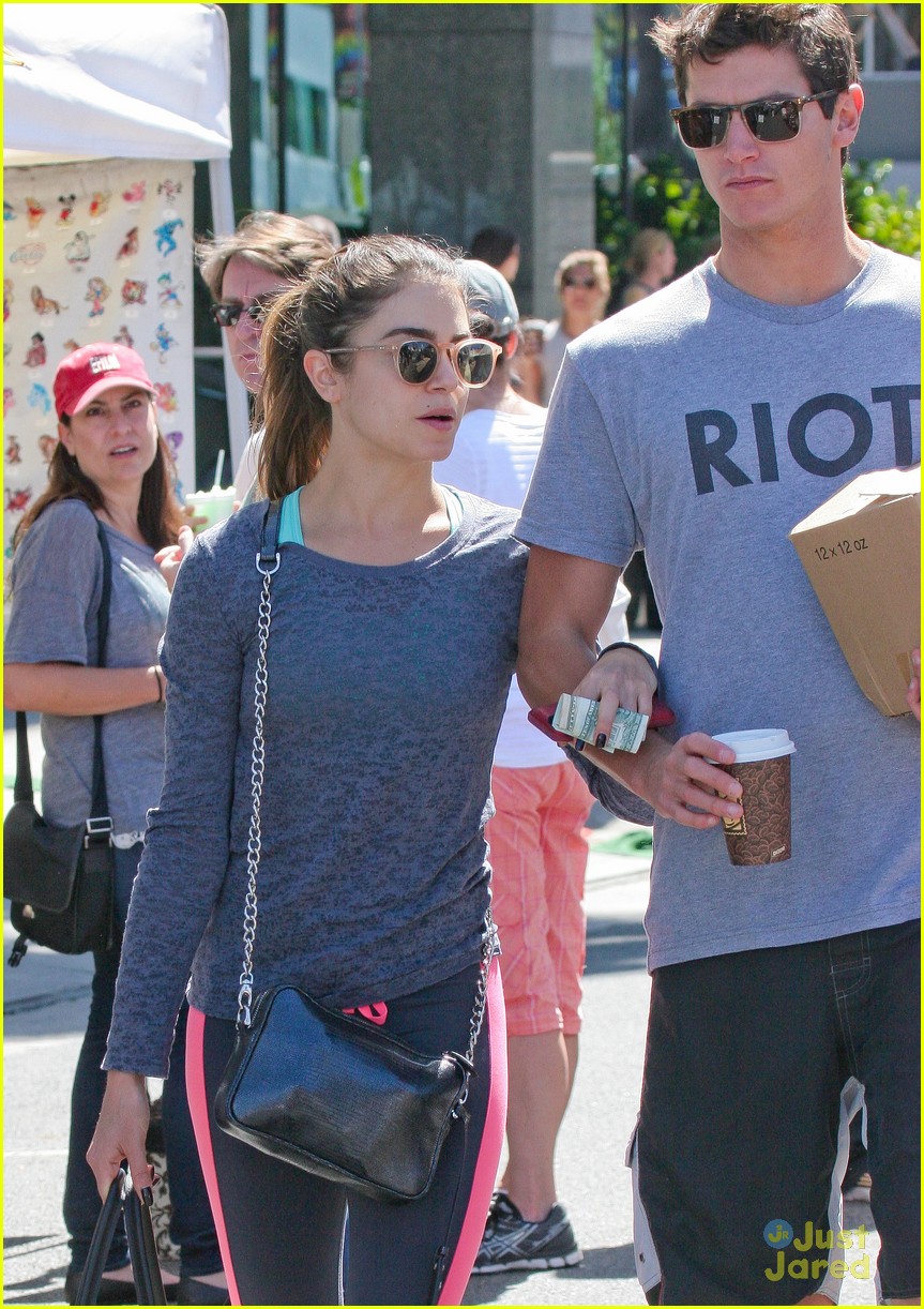 nikki reed links arms with a guy friend14