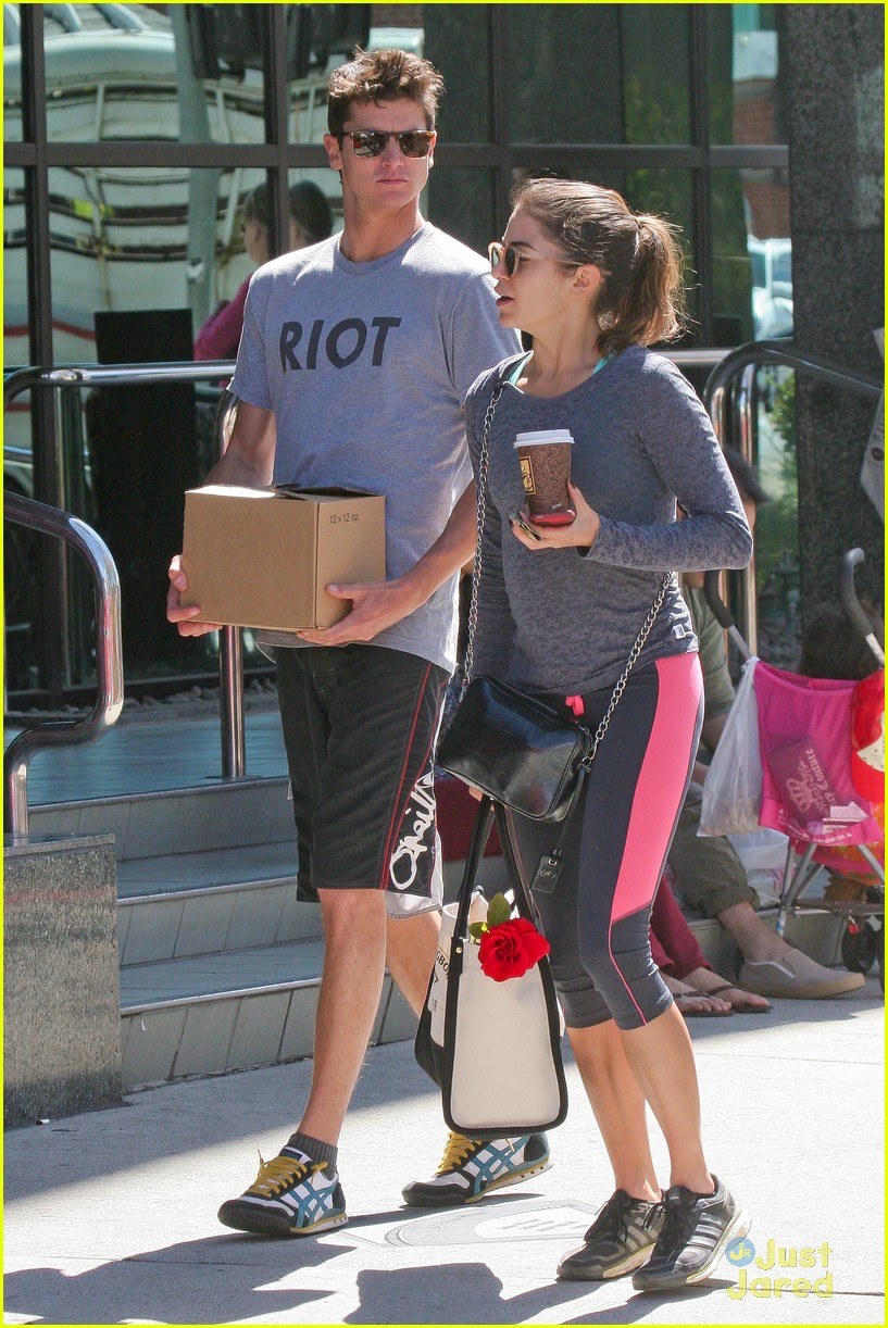 nikki reed links arms with a guy friend19