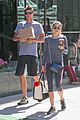 nikki reed links arms with a guy friend11