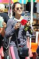 nikki reed links arms with a guy friend18