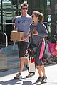 nikki reed links arms with a guy friend19