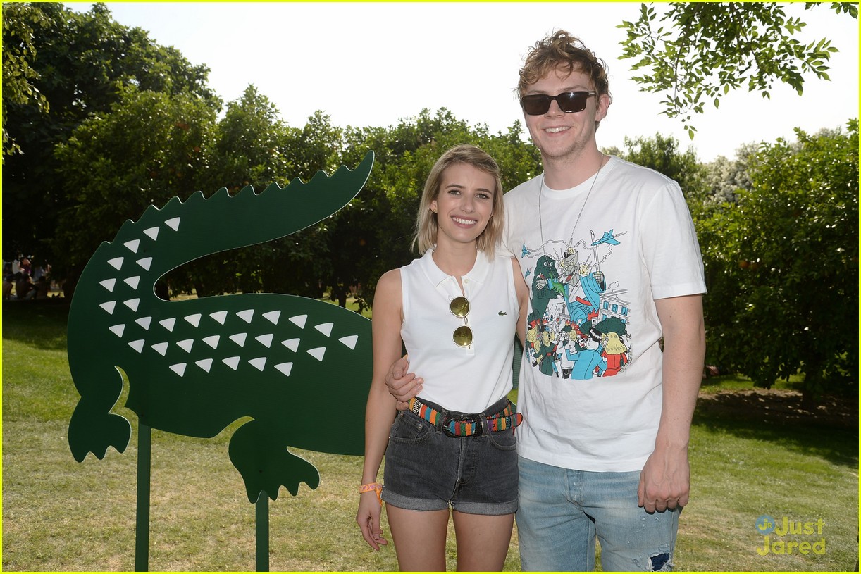 emma roberts and evan peters hold hands at coachella 201408