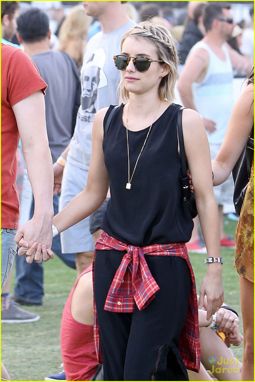 emma roberts and evan peters hold hands at coachella 201413