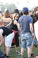 emma roberts and evan peters hold hands at coachella 201415