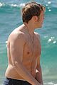 sam claflin shirtless at the beach 07