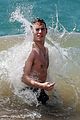 sam claflin shirtless at the beach 25