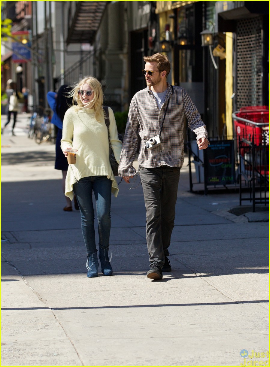 dakota fanning keeps close to her boyfriend while out in nyc27