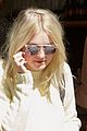 dakota fanning keeps close to her boyfriend while out in nyc04